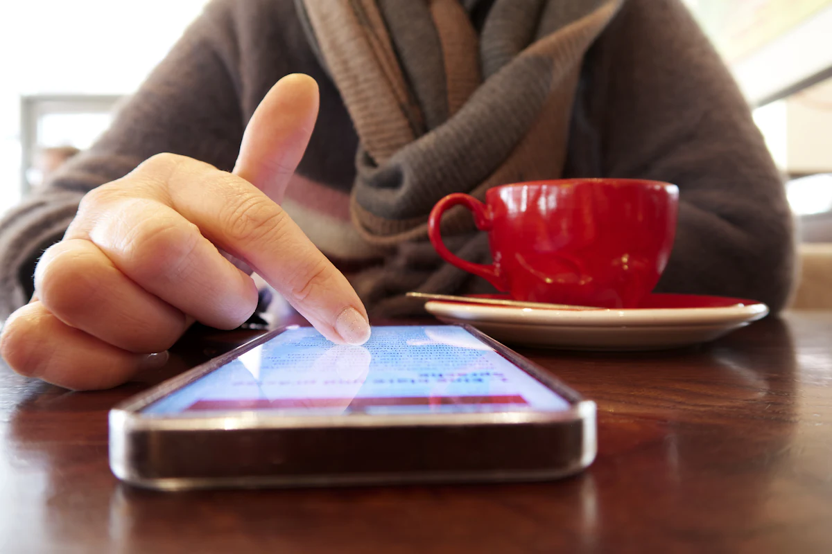 Person connecting to Wi-Fi on a smartphone